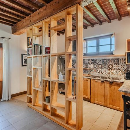 فندق ومنتجع فيلا تولومي فلورنس المظهر الخارجي الصورة A room divider in a kitchen