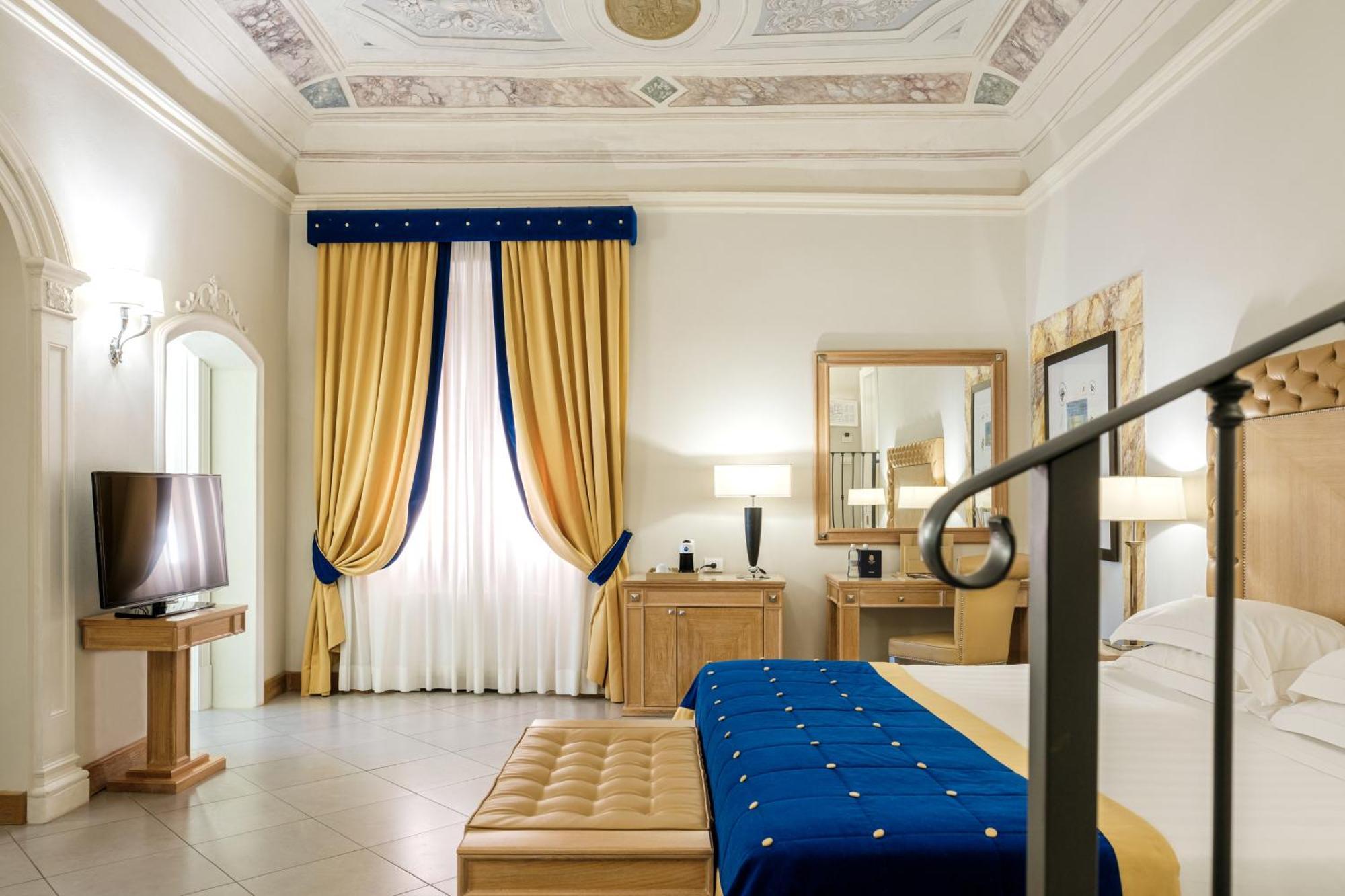 فندق ومنتجع فيلا تولومي فلورنس المظهر الخارجي الصورة A room at the hotel