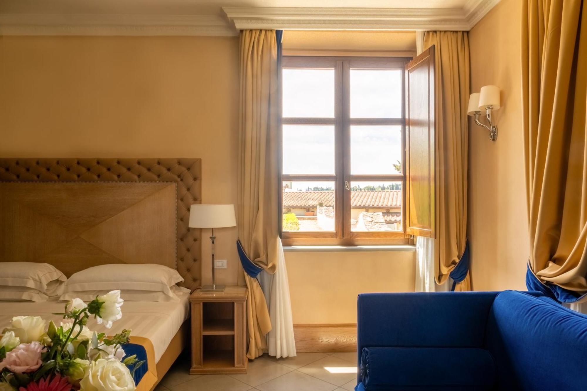فندق ومنتجع فيلا تولومي فلورنس المظهر الخارجي الصورة A room at the hotel