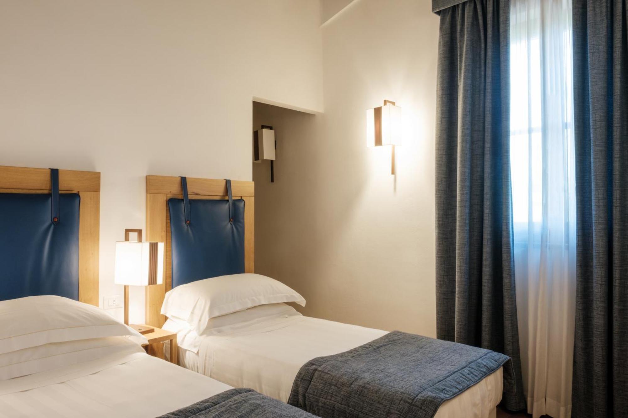 فندق ومنتجع فيلا تولومي فلورنس المظهر الخارجي الصورة A room at the hotel