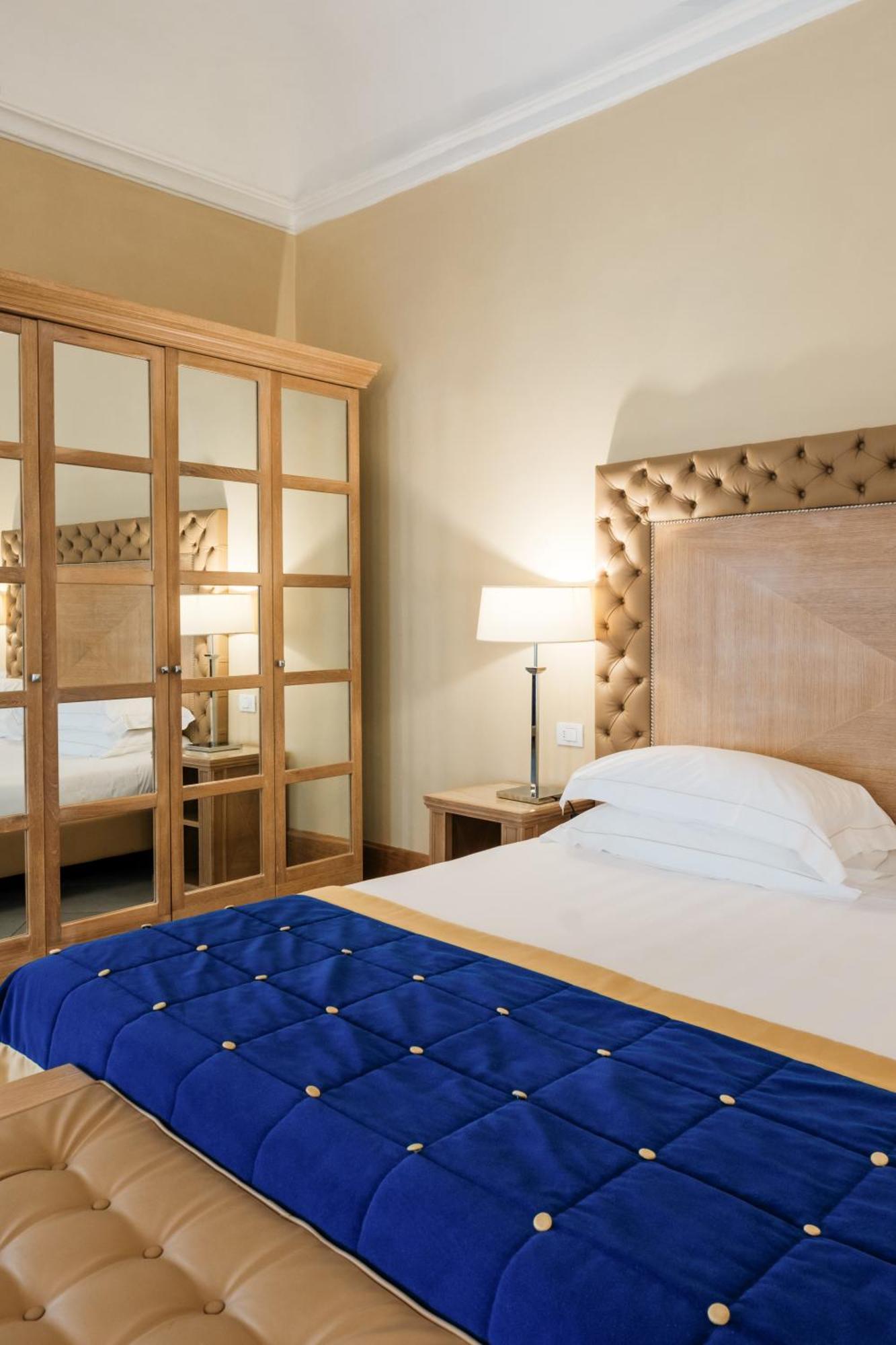 فندق ومنتجع فيلا تولومي فلورنس المظهر الخارجي الصورة A bedroom at the hotel