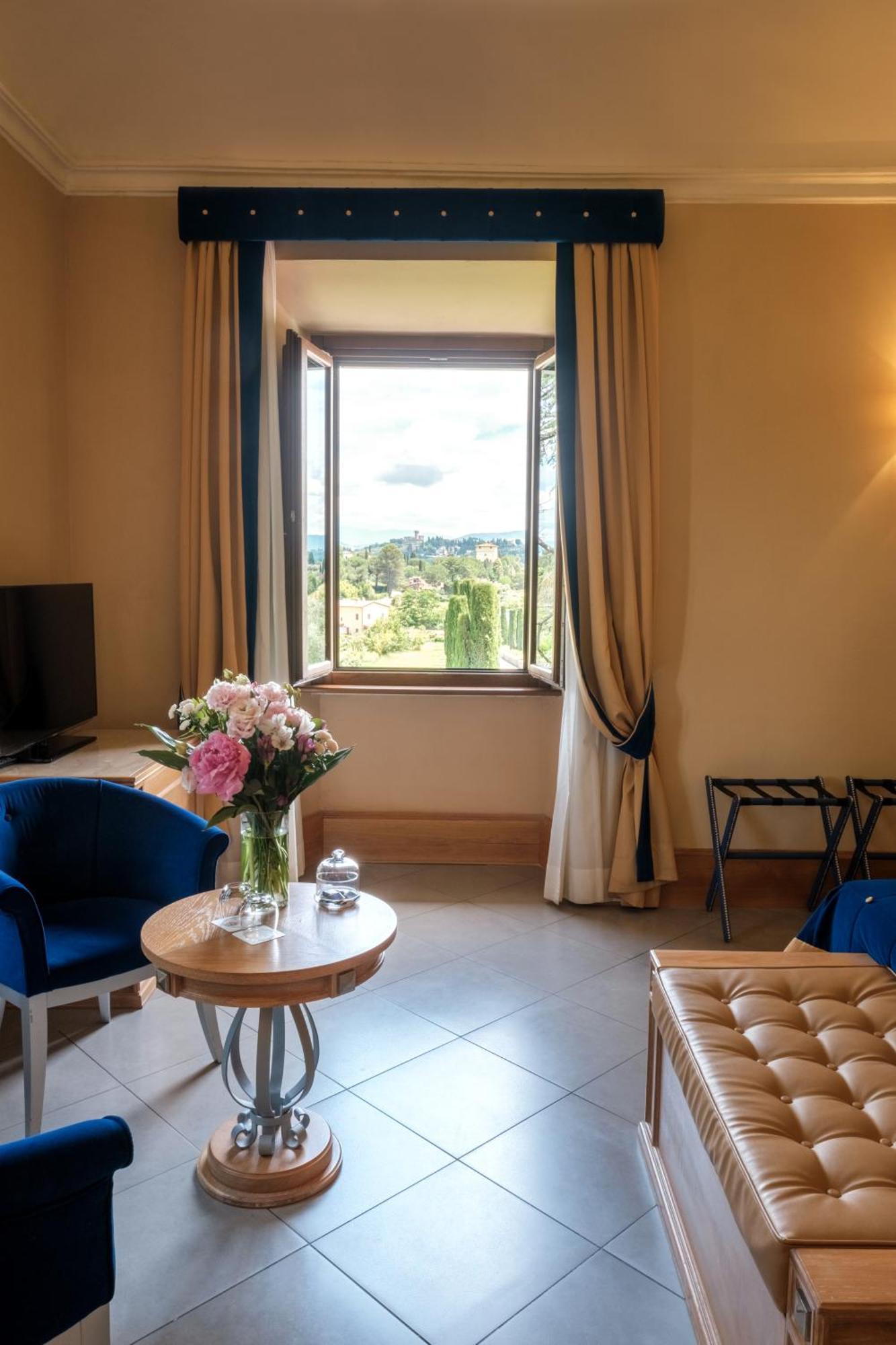 فندق ومنتجع فيلا تولومي فلورنس المظهر الخارجي الصورة A room at the hotel