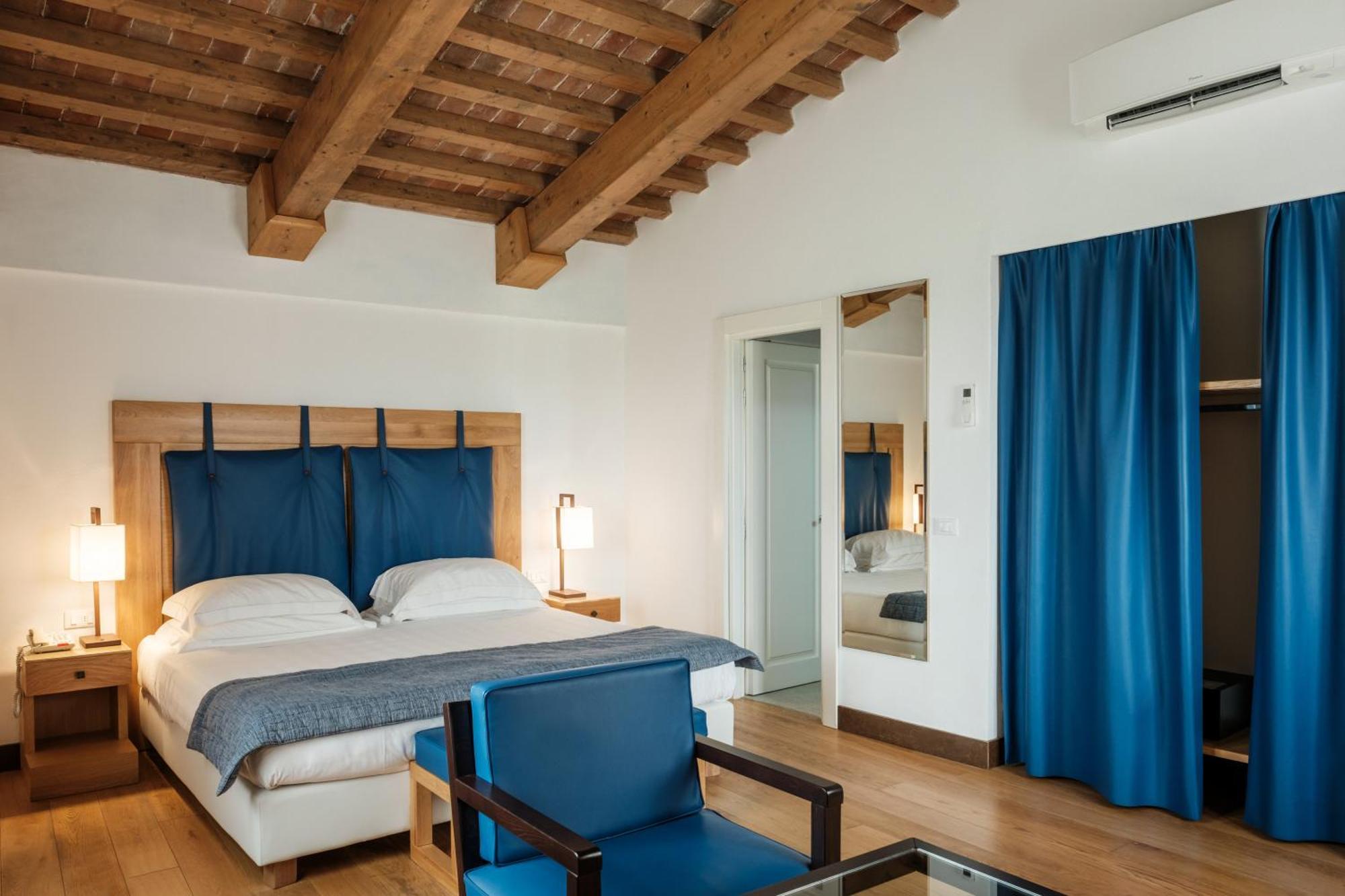 فندق ومنتجع فيلا تولومي فلورنس المظهر الخارجي الصورة A room at the hotel