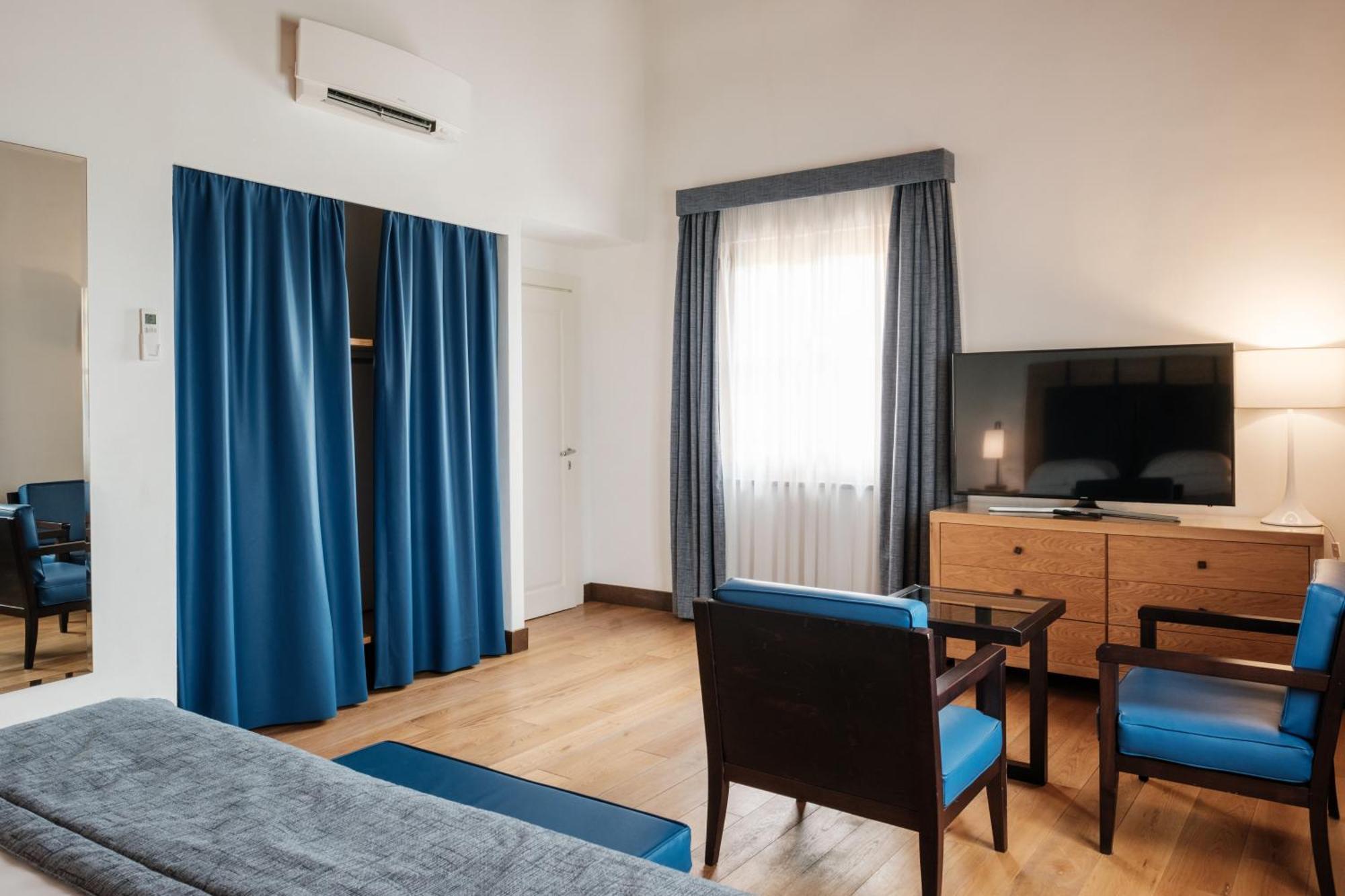 فندق ومنتجع فيلا تولومي فلورنس المظهر الخارجي الصورة A room at the hotel