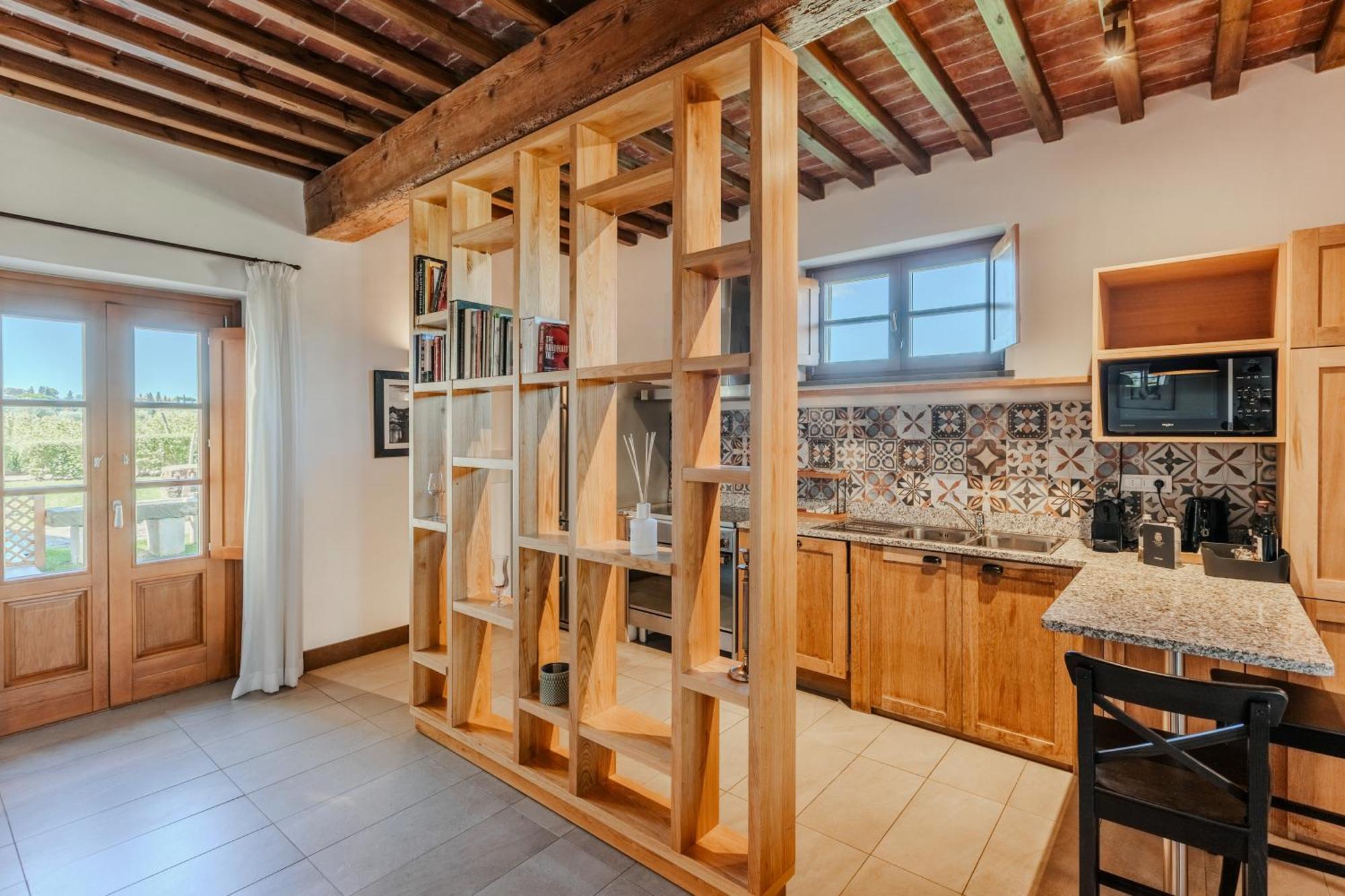 فندق ومنتجع فيلا تولومي فلورنس المظهر الخارجي الصورة A room divider in a kitchen