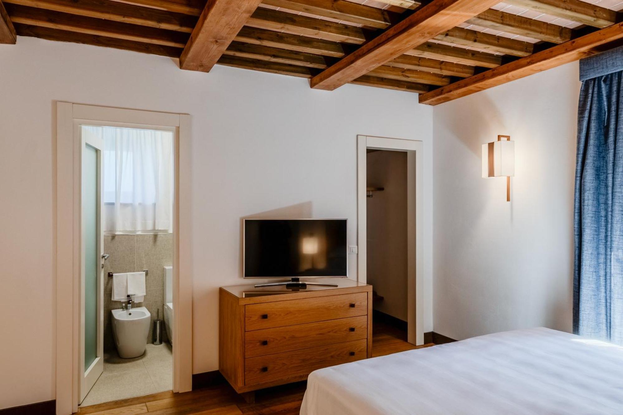 فندق ومنتجع فيلا تولومي فلورنس المظهر الخارجي الصورة A room at the hotel