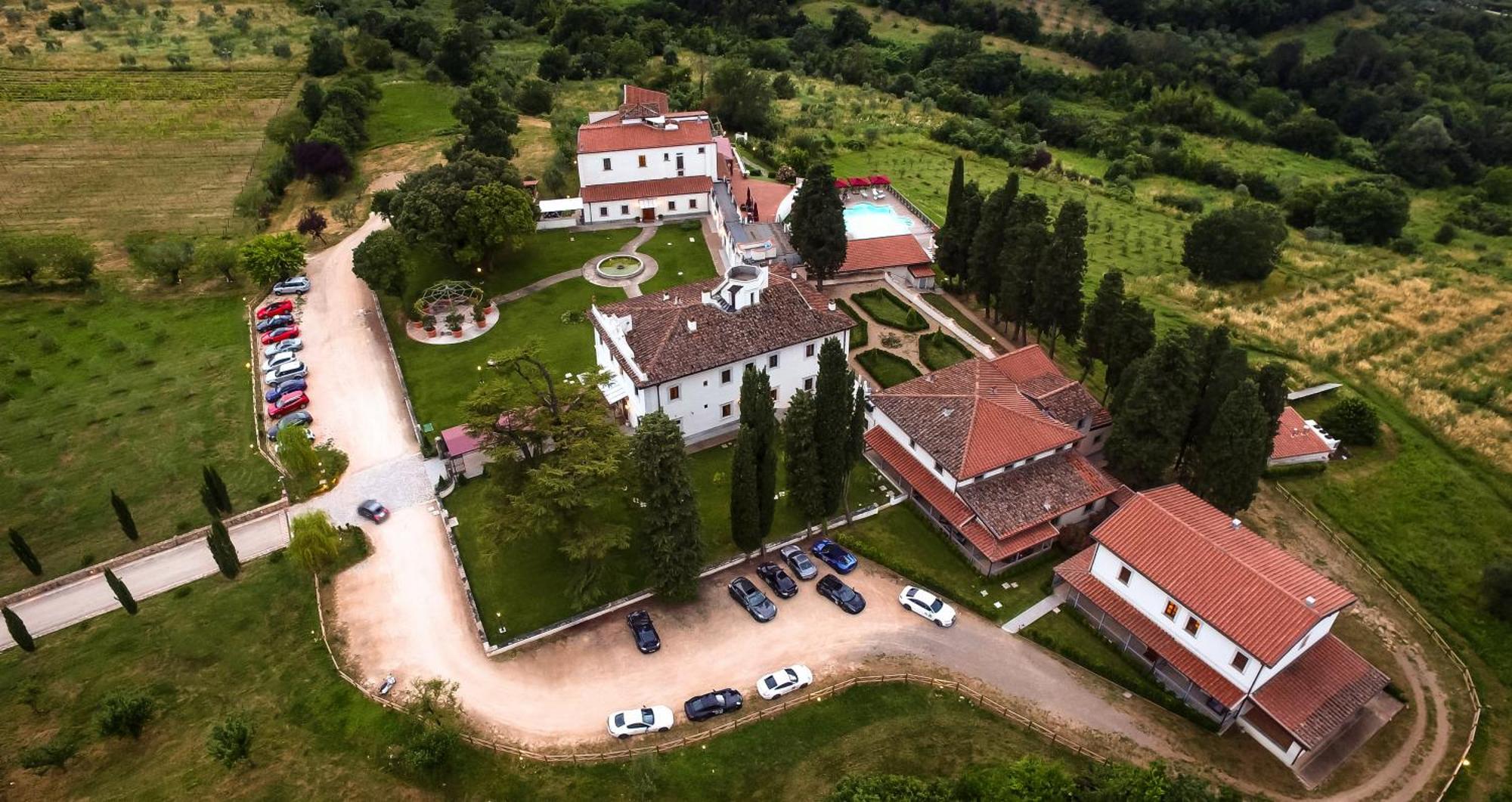 فندق ومنتجع فيلا تولومي فلورنس المظهر الخارجي الصورة Aerial view of the monastery